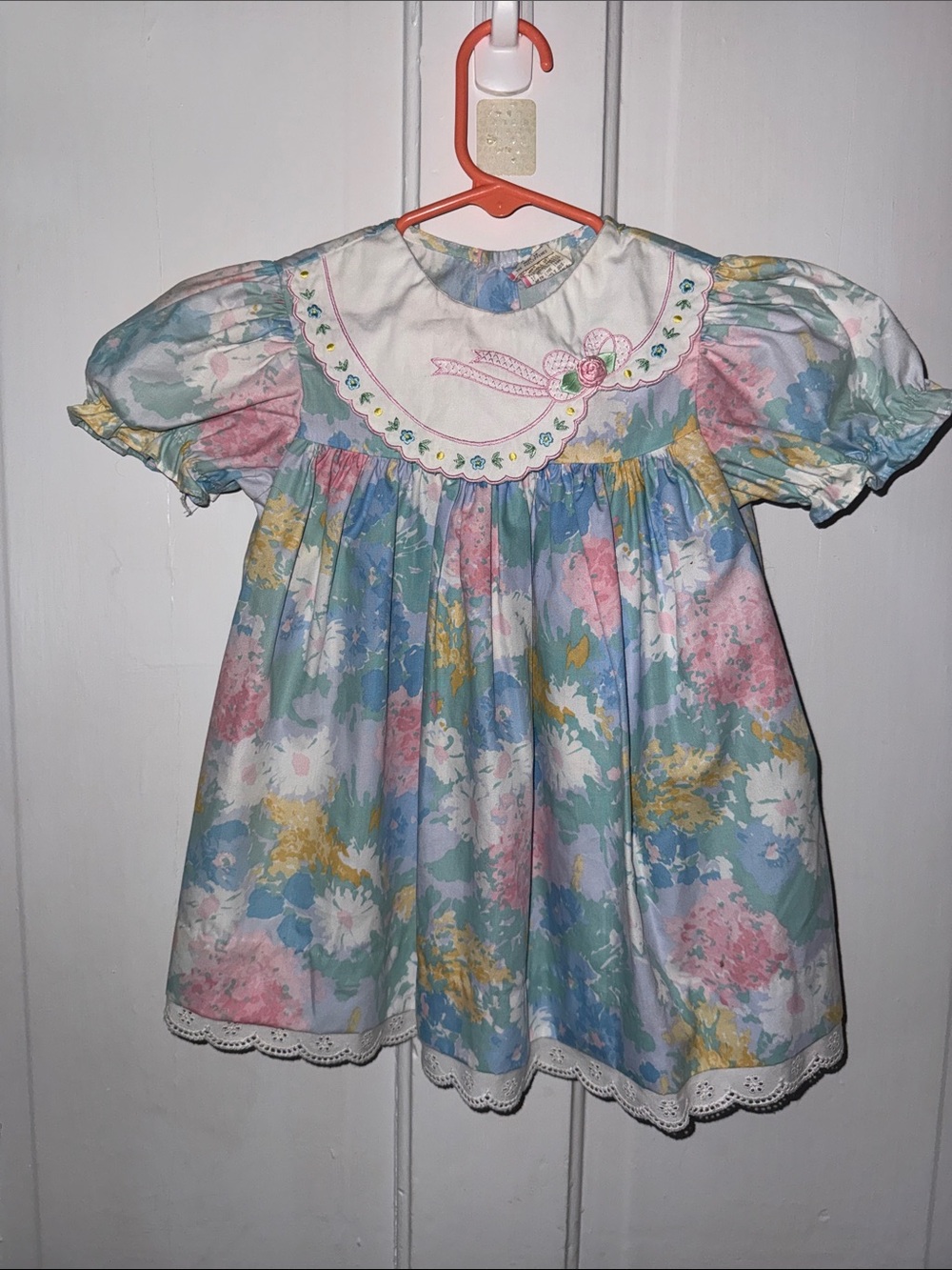 Pastel Floral Baby Dress with Embroidered Bib